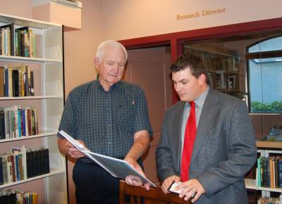 Mountain Meadows Monument Foundation Library Committee Chair Burr Fancher with the Sharlot Hall Museum Library and Archives Research Director Ryan S. Flahive.